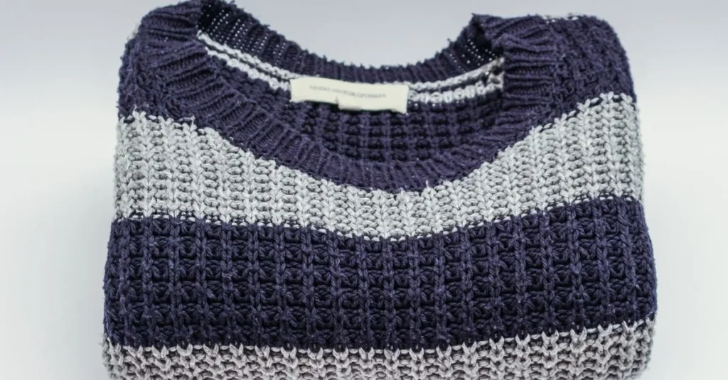 Striped knit sweater in cool tones for capsule wardrobe