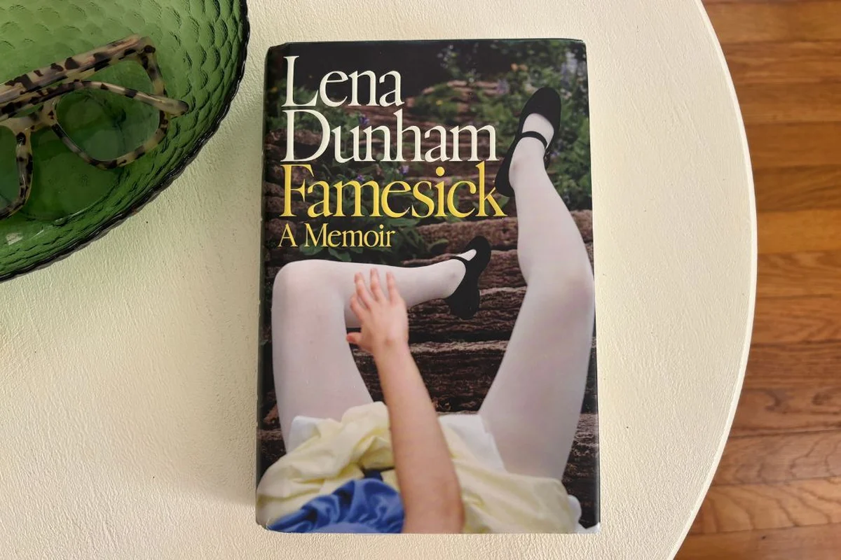 Famesick book cover by Lena Dunham on a white table