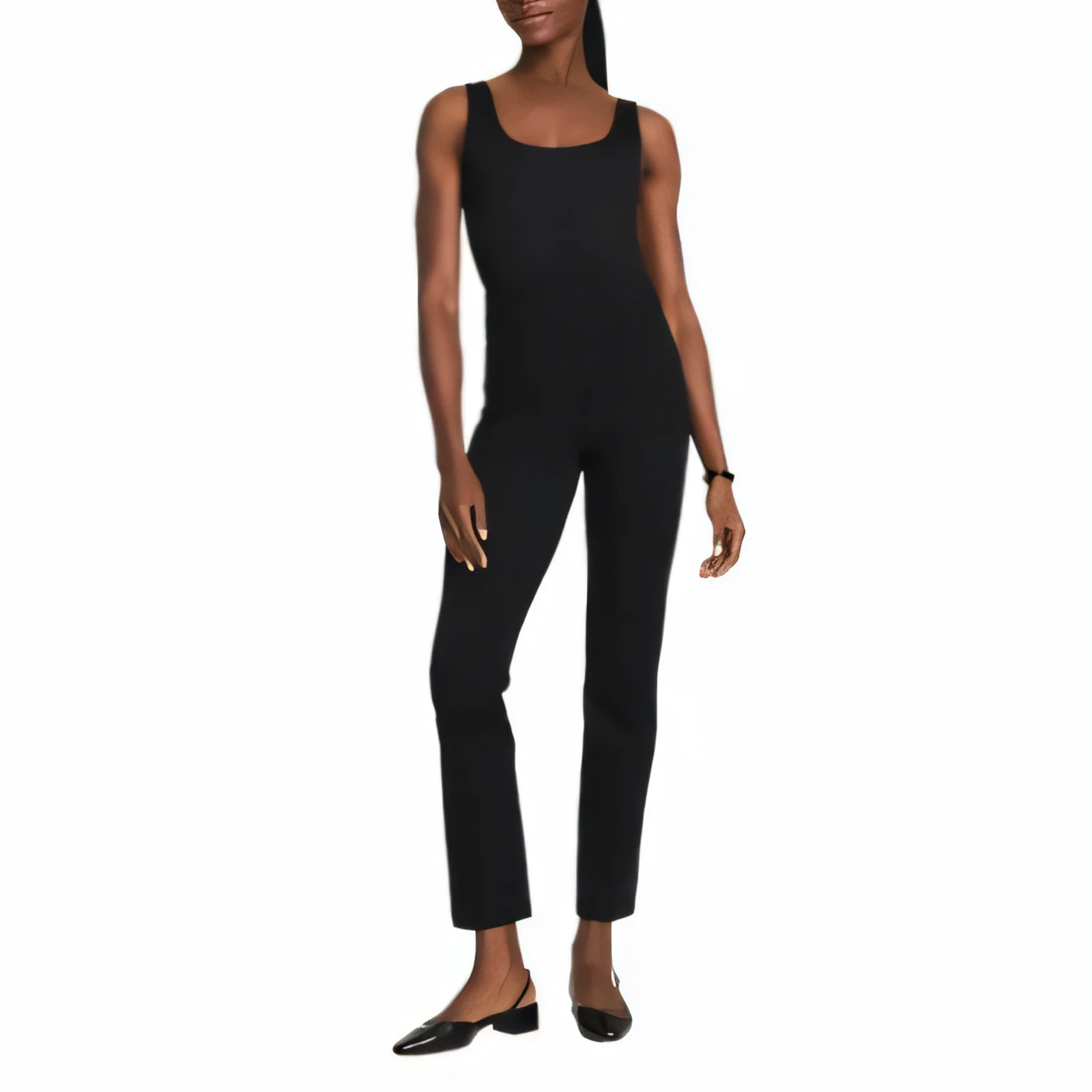 Woman wearing black Spanx PerfectFit ponte pants
